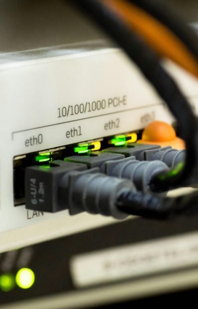 network-cable-ethernet-computer-159304-159304 Detailed close-up of ethernet cables and network connections on a router, showcasing modern technology.