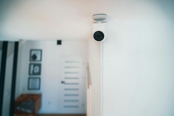 pexels-photo-26597080-26597080 A sleek indoor security camera installed in a contemporary home for monitoring and safety.