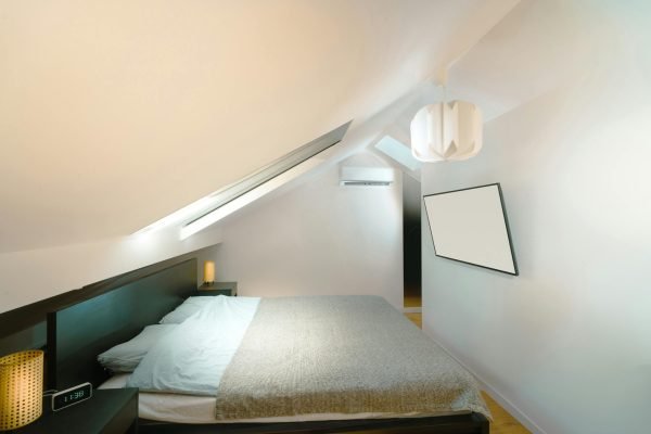 pexels-photo-27083031-27083031 A sleek and minimalist attic bedroom with modern furnishings and natural lighting.